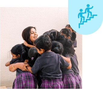 Students at EKYA Schools Bangalore sharing a joyful group hug, representing the collaborative and supportive learning environment at international schools in Bangalore